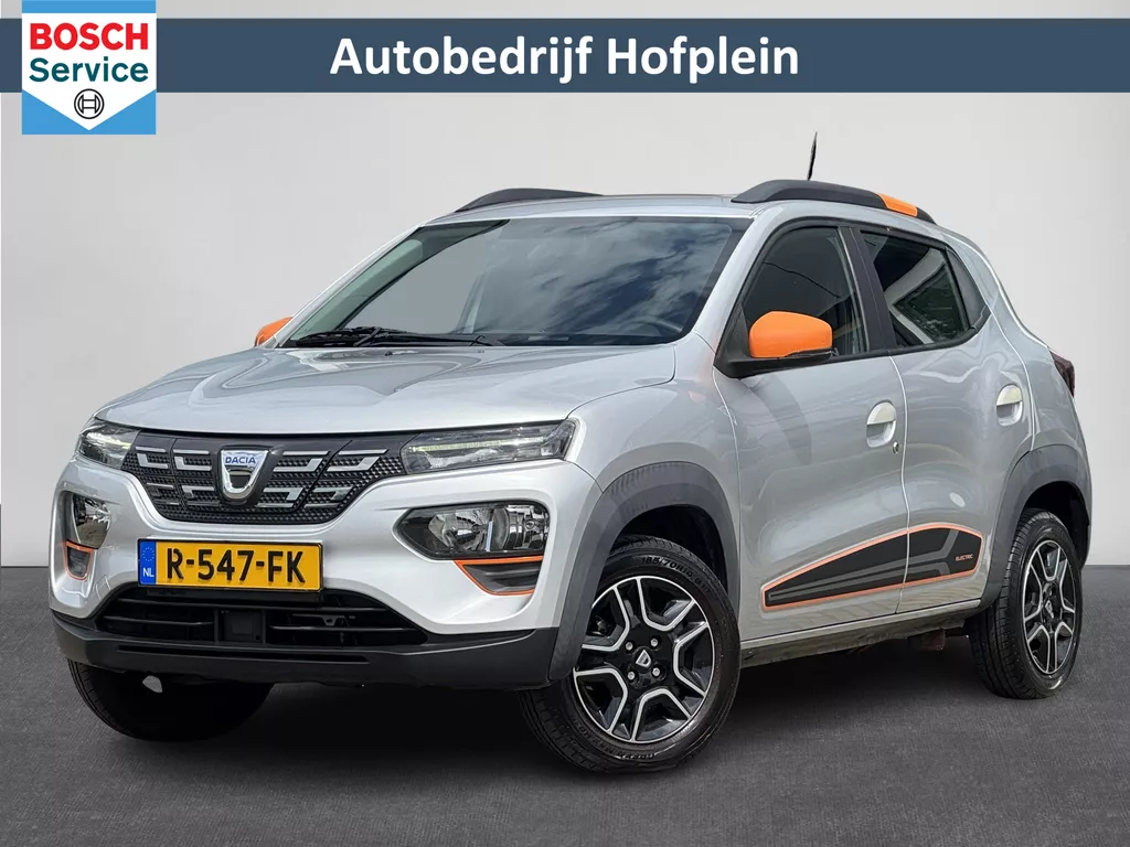 Dacia Spring Comfort Plus (Orange Pack) 27 kWh |92,4 SOH ! | 1e Eigenaar | Elektrisch | Airco | LM-Velgen | Dakrail  | El ramen V+A | Camera | Centrale vergrendeling | 13.091 KM!!